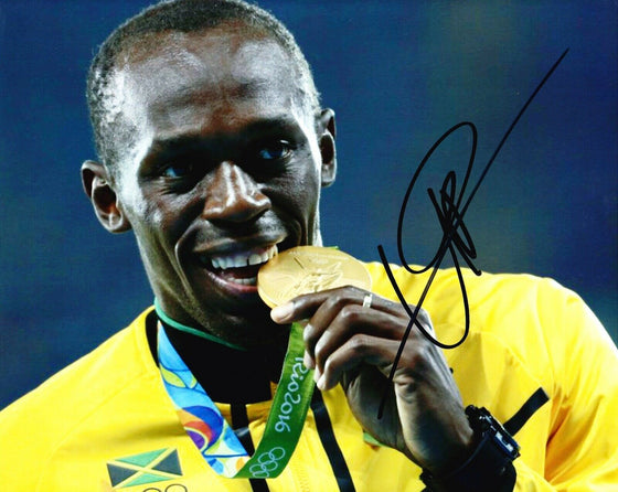 Usain Bolt Signed 10X8 PHOTO DISPLAY Olympic Legend JAMAICA AFTAL COA (T)