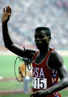 Carl Lewis Signed 12X8 PHOTO DISPLAY Olympic Legend USA AFTAL COA (D)