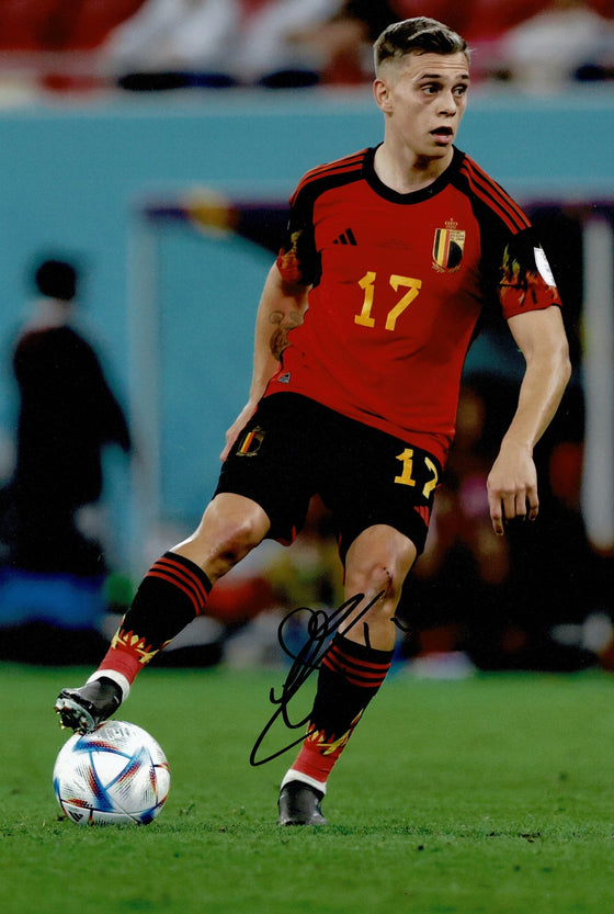 Leandro Trossard Signed Arsenal F.C. & Belgium 12X8 Photo AFTAL COA (1759)