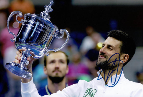 Novak Djokovic Signed 12X8 PHOTO Genuine Signature 24th Grand Slam AFTAL COA (E)